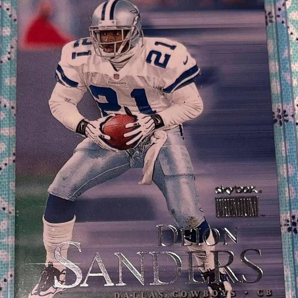 Deion SANDERS 1999 Fleer/Skybox TRADED Football card #106